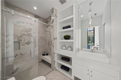 Exquisite lake view custom estate, tucked behind triple gates in