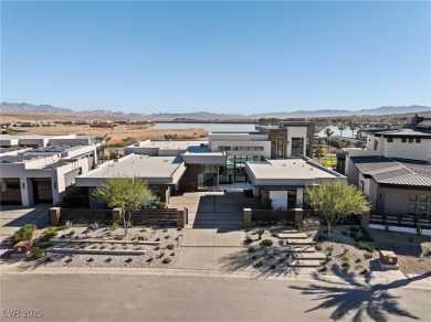 Exquisite lake view custom estate, tucked behind triple gates in