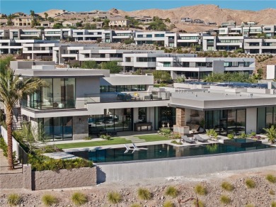 Exquisite lake view custom estate, tucked behind triple gates in