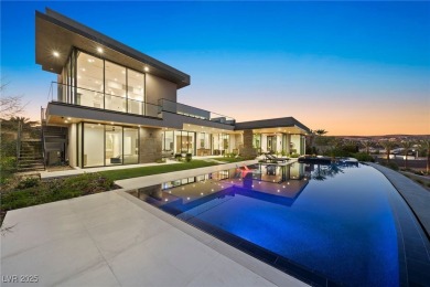 Exquisite lake view custom estate, tucked behind triple gates in