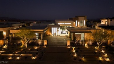 Exquisite lake view custom estate, tucked behind triple gates in