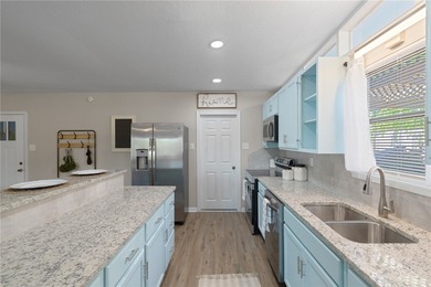 Waterfront Living at Its Finest! With direct Access to the