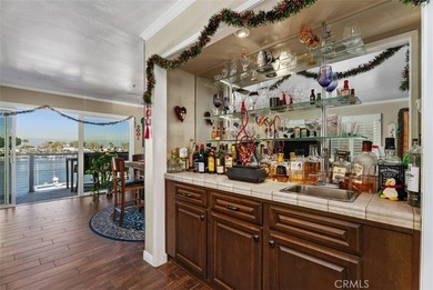 Experience waterfront living with stunning panoramic views in