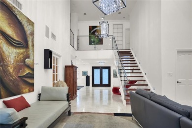 Stunning Mediterranean 4BD/4.5BA home on one of Coral Gables'