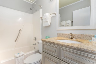 Stunning top floor oceanfront end unit in the heart of Surfside