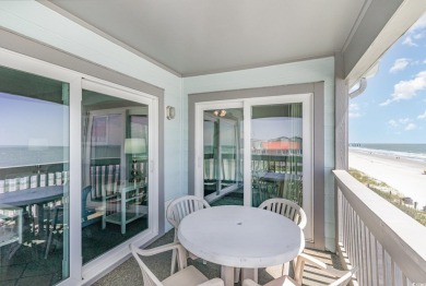 Stunning top floor oceanfront end unit in the heart of Surfside