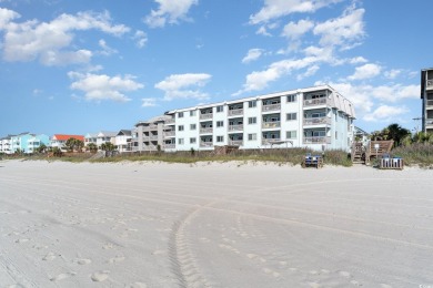 Stunning top floor oceanfront end unit in the heart of Surfside