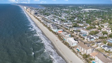 Stunning top floor oceanfront end unit in the heart of Surfside