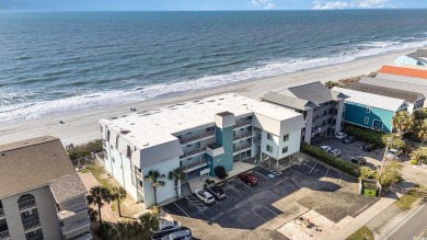 Stunning top floor oceanfront end unit in the heart of Surfside