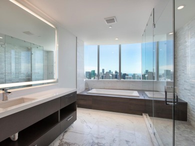 Spectacular 4 bedroom, 5 bathroom penthouse unit with an