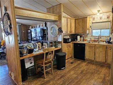 Perfectly situated on an oversized corner lot within the highly