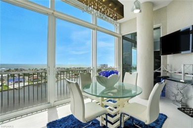 Perched at the very end of Bay Beach Lane, this exceptional