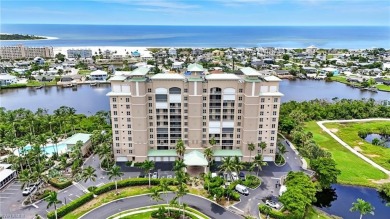 Perched at the very end of Bay Beach Lane, this exceptional