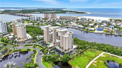 Perched at the very end of Bay Beach Lane, this exceptional