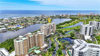 Perched at the very end of Bay Beach Lane, this exceptional