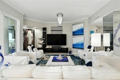 Perched at the very end of Bay Beach Lane, this exceptional