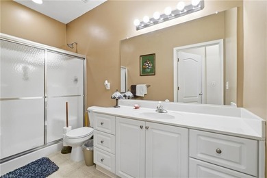 Second story condo with elevator. Covered balcony.  Large open