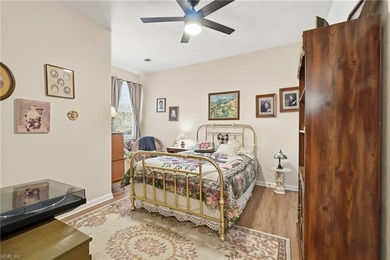 Second story condo with elevator. Covered balcony.  Large open