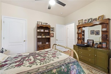 Second story condo with elevator. Covered balcony.  Large open