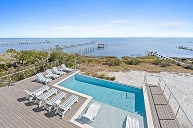 BAYFRONT NEW CONSTRUCTION HOME LOCATED ON CAPE SAN BLAS NORTH -