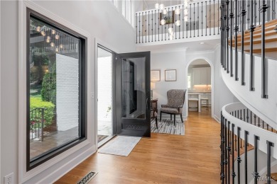 Nestled on a private 2.41-acre lot with an additional 1.51-acre