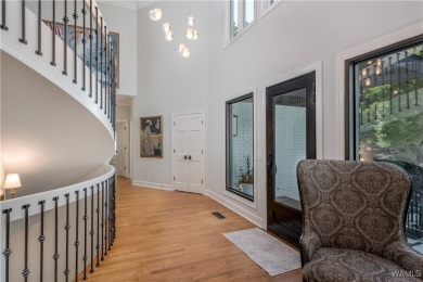 Nestled on a private 2.41-acre lot with an additional 1.51-acre