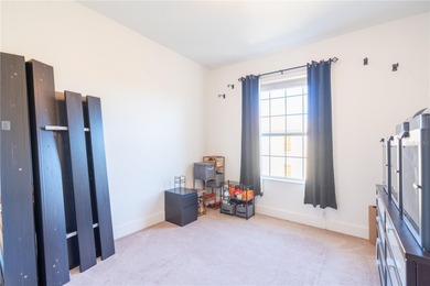 Top-floor 4th-floor condo in Stonebridge Reserve with pool and