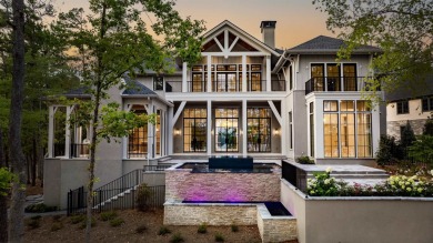 WELCOME TO THE PINNACLE OF LAKESIDE LUXURY, NESTLED WITHIN THE