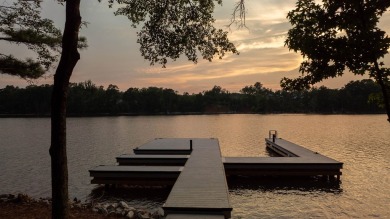 WELCOME TO THE PINNACLE OF LAKESIDE LUXURY, NESTLED WITHIN THE