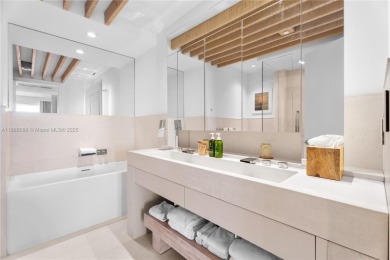 Live the ultimate South Beach lifestyle in this turnkey 3-bed, 3