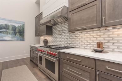 You'll find classic elegance in this transitional-style lake