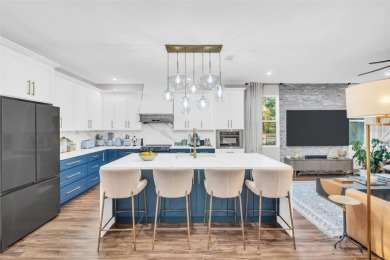 This magnificent 2-year-old home overlooks a 170-acre nature