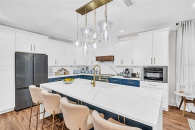 This magnificent 2-year-old home overlooks a 170-acre nature