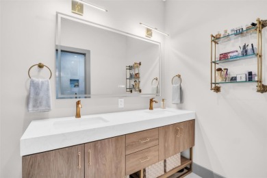 This magnificent 2-year-old home overlooks a 170-acre nature