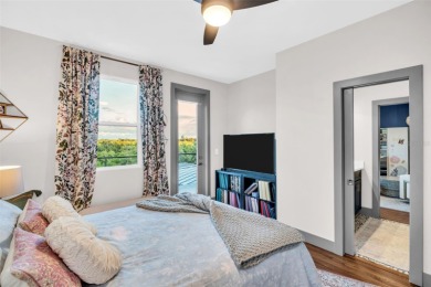 This magnificent 2-year-old home overlooks a 170-acre nature