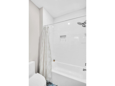 This magnificent 2-year-old home overlooks a 170-acre nature