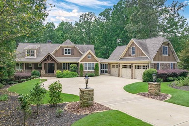 This stunning 4-bedroom, 4-bath home offers a refined living