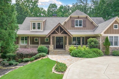 This stunning 4-bedroom, 4-bath home offers a refined living