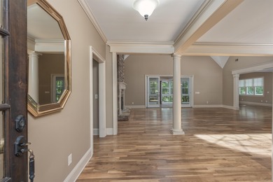 This stunning 4-bedroom, 4-bath home offers a refined living