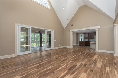 This stunning 4-bedroom, 4-bath home offers a refined living