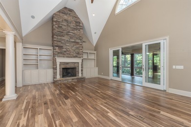 This stunning 4-bedroom, 4-bath home offers a refined living