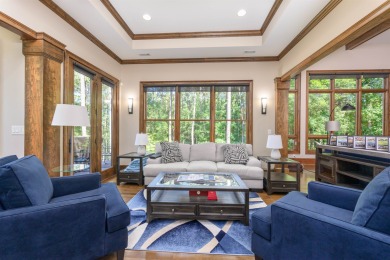 Experience refined golf living in this custom-built home located