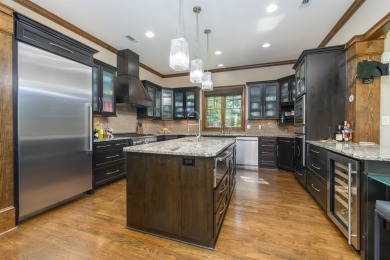 Experience refined golf living in this custom-built home located