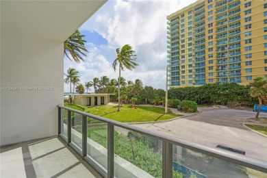 Wake up steps from the sand in this ground-floor 2-bedroom condo