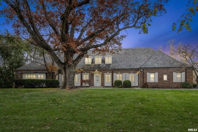 This classic brick Cape Cod Colonial ranch stands the test of