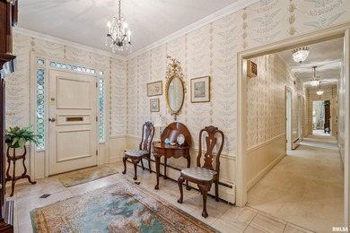 This classic brick Cape Cod Colonial ranch stands the test of