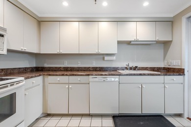 his impeccably maintained 2-bedroom, 2-bathroom condo offers a