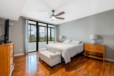 his impeccably maintained 2-bedroom, 2-bathroom condo offers a