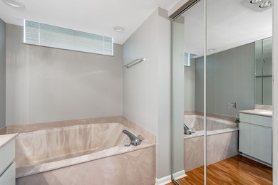 his impeccably maintained 2-bedroom, 2-bathroom condo offers a