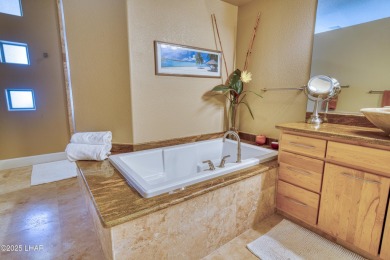 Welcome to 3481 Pocahontas Drive! This Elegant Custom home is